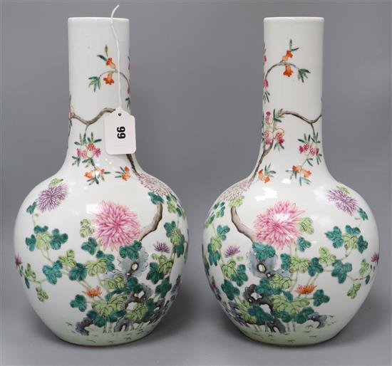 A pair of Chinese famille rose bottle vases H.40cm